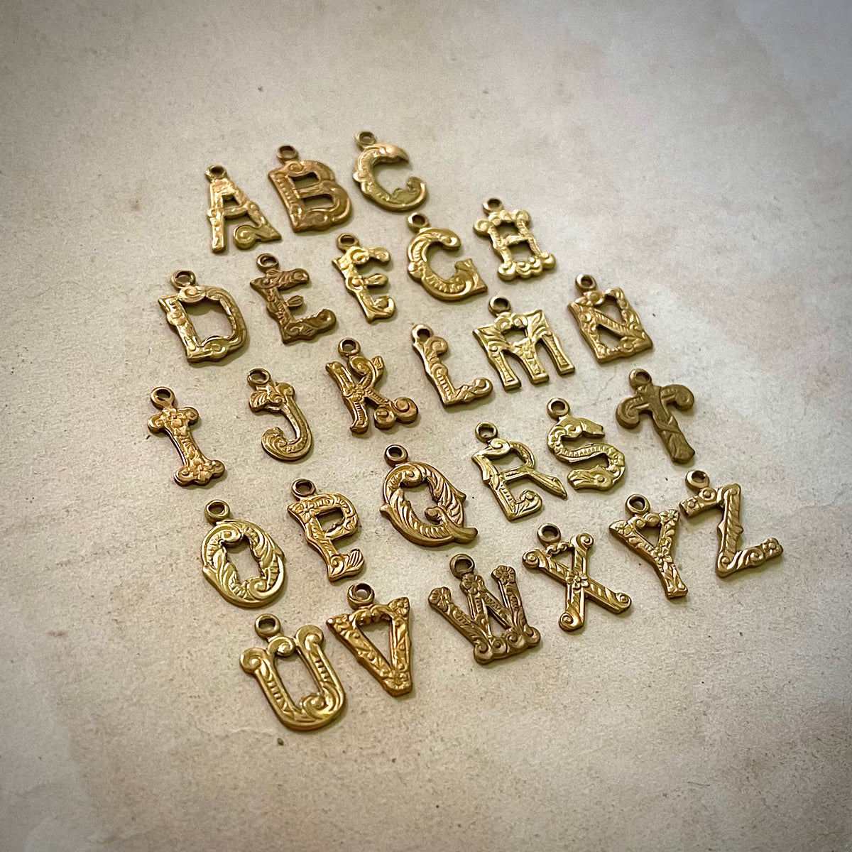 Assortment of Vintage Brass Letter Charms B E F G H M N P R S T W