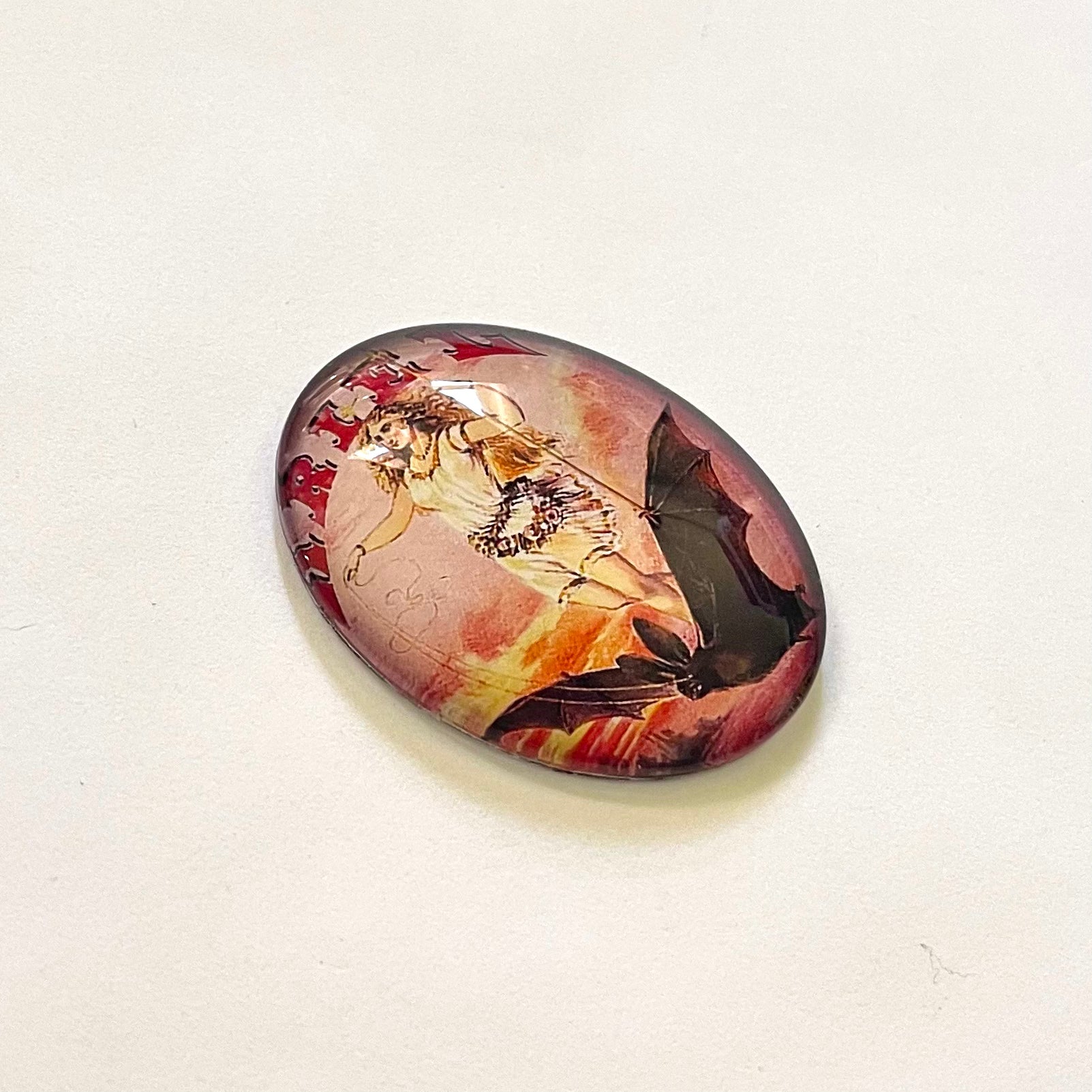 Victorian Woman riding a Bat Advertising Illustration Cameo Cabochon